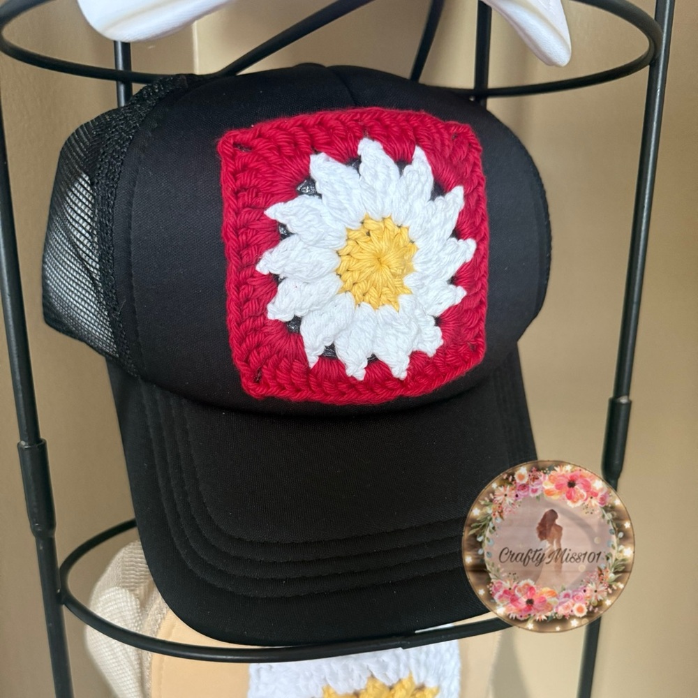 Black Trucker Hat with Red and White Crochet Flower Patch